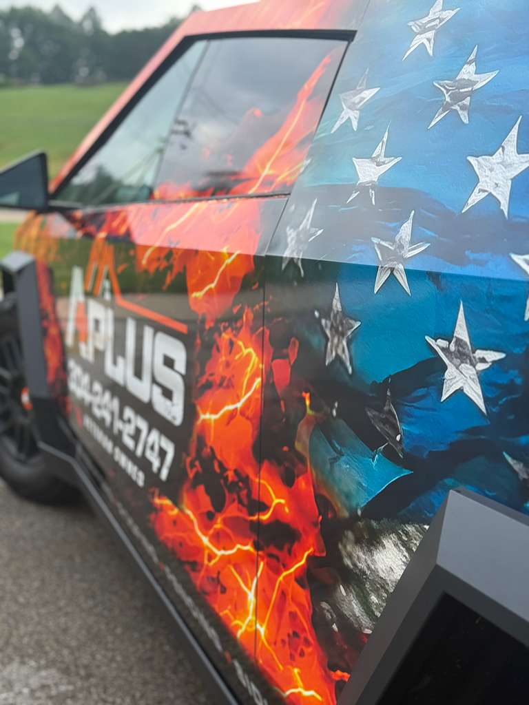 Flame and flag wrap on a Cybertruck