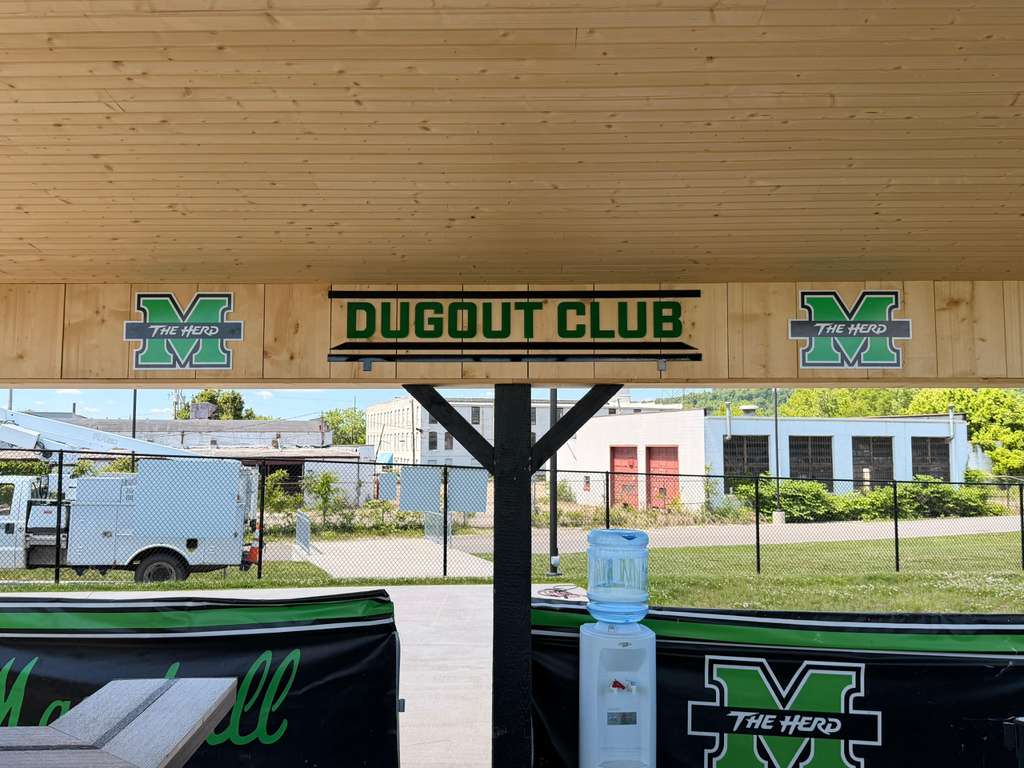 Dugout Club wood sign with Marshall Herd logos
