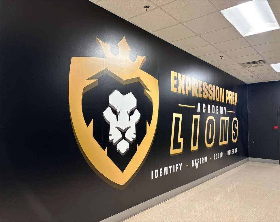 Finished Lions mascot wall mural at Expression Prep Academy