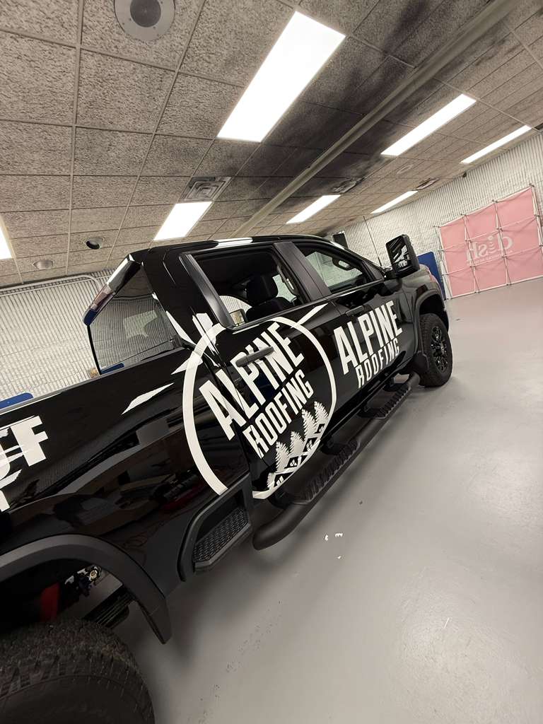 Alpine Roofing branded truck wrap