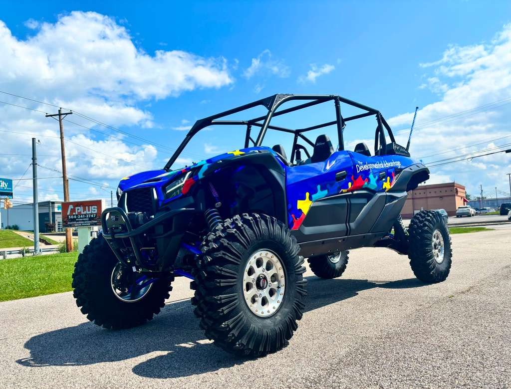 Autism-awareness puzzle piece wrap on a UTV