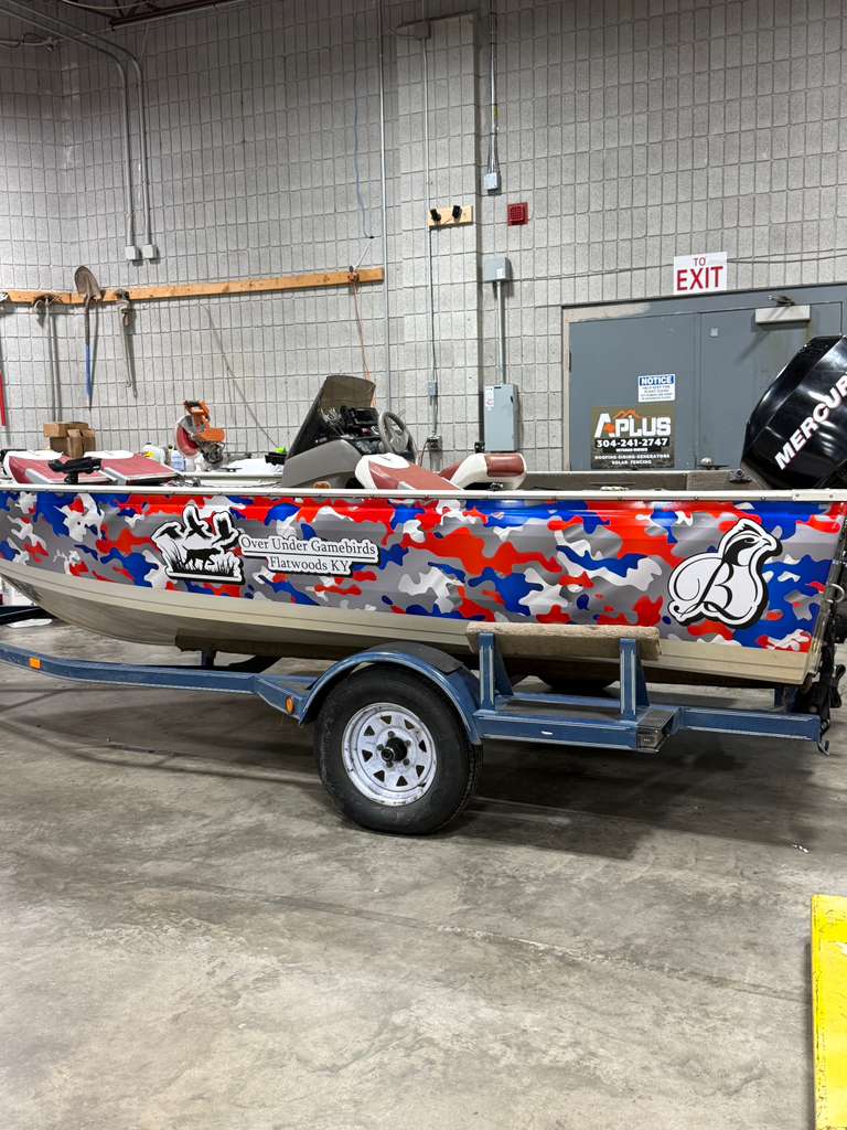 Red, white, and blue camo wrap on a fishing boat and trailer