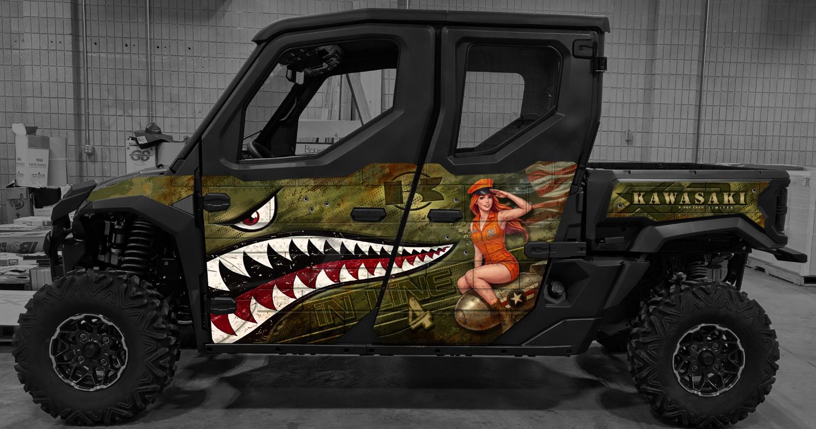 Shark-mouth nose-art wrap on a Kawasaki UTV